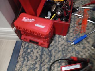 Miscellaneous tools wrenches rashes sockets knives flashlights rechargeable headlight all name brand Milwaukee DeWalt Craftsman and some off-brand a l
