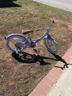 Girl bike with training wheels