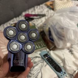 Six Rotor Head Shaver For A “BIC” Shave
