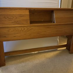 $75.00 Used Good Condition Solid Oak Queen Size Headboard .