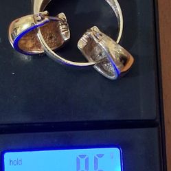 un Par de argollas Y un anillo de 10k  9,50g