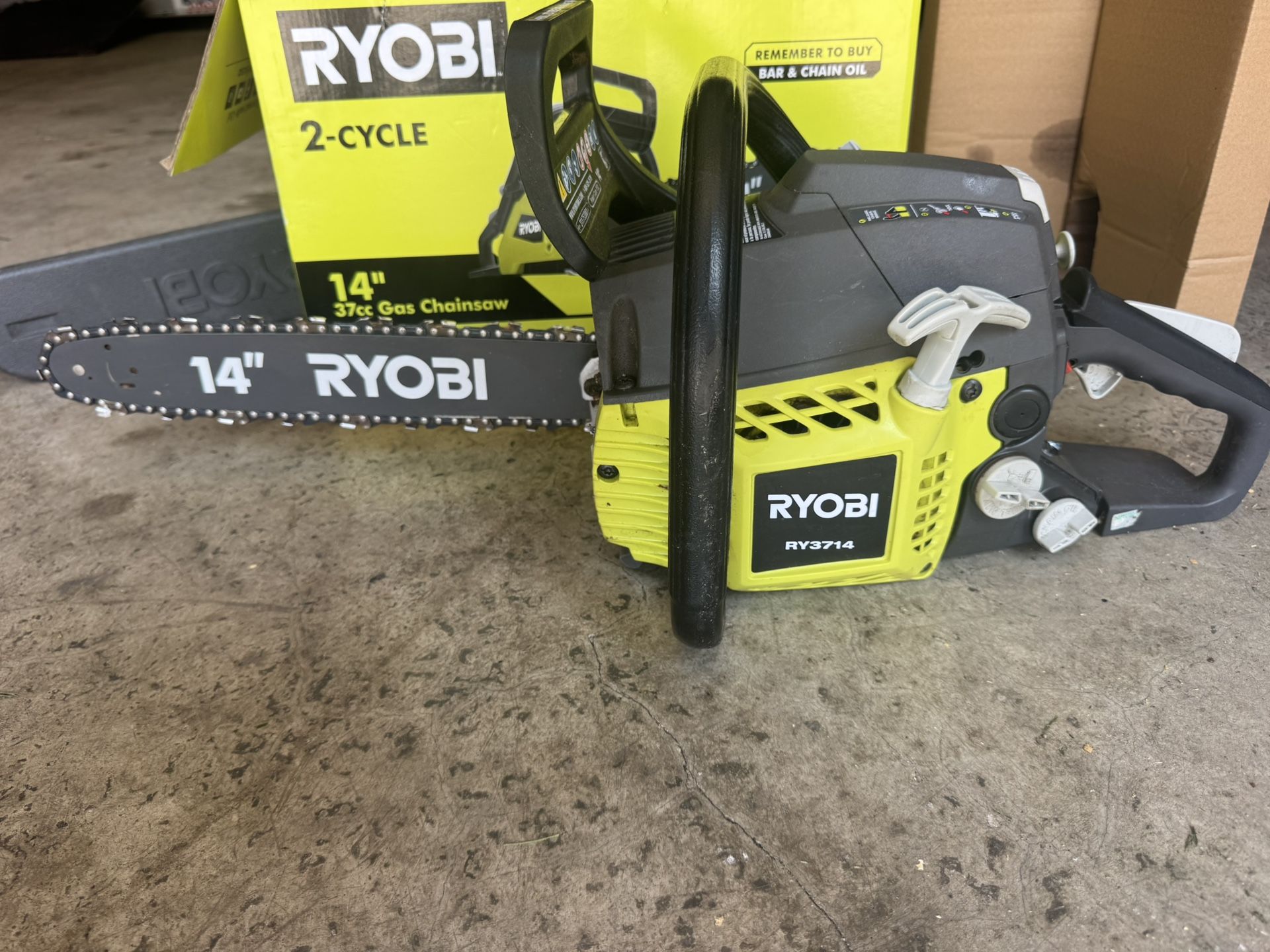 Ryobi 14” Chainsaw 37cc Two Cycle Engine Light Used. Works Good. Must Pickup