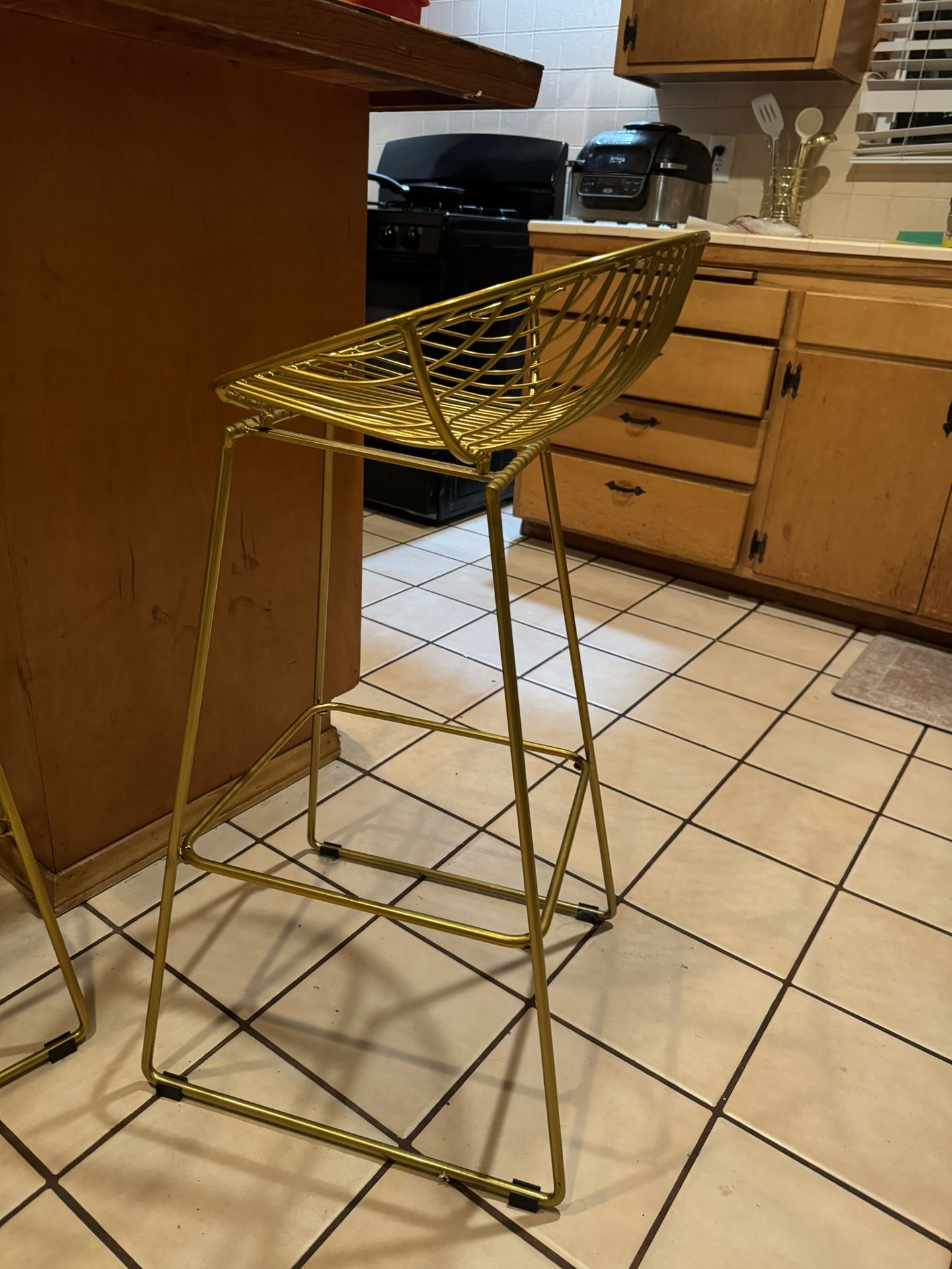 2 GOLD BAR STOOLS LEFT