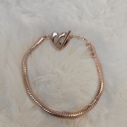 Pandora Moments Heart T-Bar Snake Chain Bracelet in 14k rose gold-plated metal. 