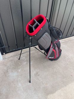 Topflite lightweight Golf bag in Excellent Condition - like new - only used a couple of times with fold out stand