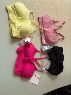 4 sports bras with tags