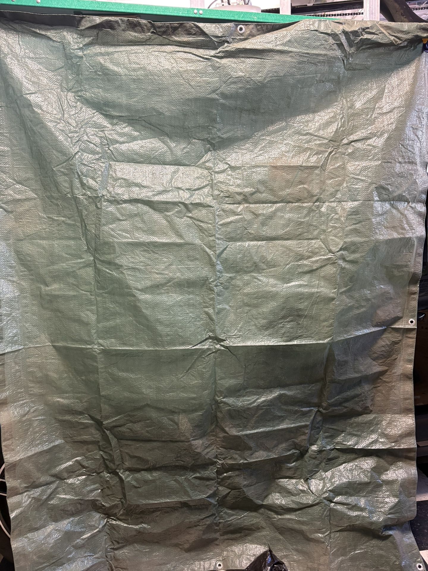 Plastic Tarp Approximately 84”x 65” Size