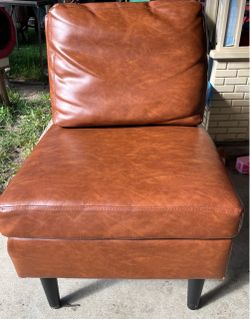 Brown leather sofa chair