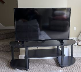 Flatscreen TV and TV Stand
