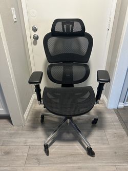 Ergonomic Mesh Office Chair with Headrest and Lumbar Support.