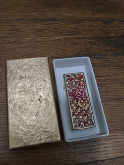 Vintage Red Sharp Gas Lighter Made In Japan With An Ornate Gold Floral Pattern