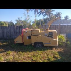 (2) Vermeer BC 1000 (2) John Deere Workhorses