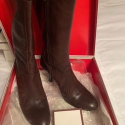 Brown leather coach women’s boots 