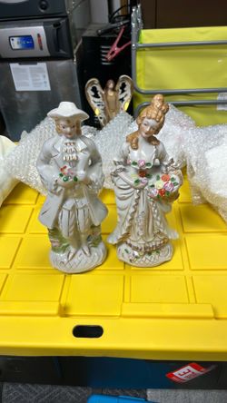 Matching pair of vintage porcelain figurines