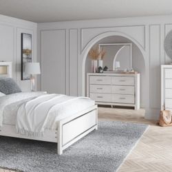 Altyra White Upholstered Bookcase LED Panel Bedroom Set

