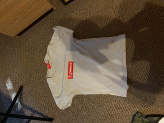 Authentic supreme shirts, stickers, and poncho, also bape shirt LOOKING FOR TRADES I WANT TO TRADE FOR FOOTBALL CARDS