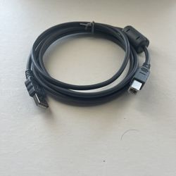 USB 2.0 Type A to Type B cable that connects peripherals to a computer, printers, scanners, and audio/video hub.