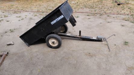 Lil trailer with dump tailgate