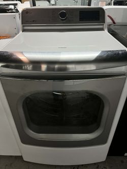 The LG is a mega-capacity, front-load electric dryer. It measures 9.0 cu. ft. drum, which is large enough to easily dry a king-size comforter and a fu