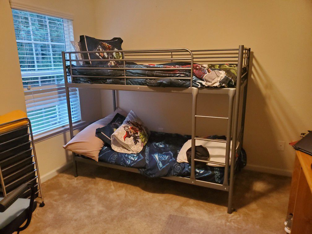 Twin size bunk bed with mattresses included.