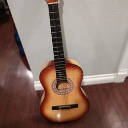 Acoustic Guitar With New Set Of Strings Included 