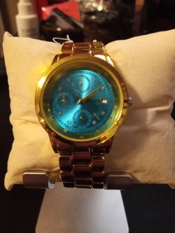 Strada Gold Tone With Turquoise Dial 