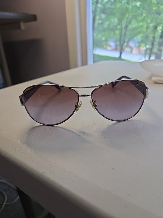 The Coach Aviator Sunglasses HC 7003-L012 Kristina 9125/68 Silver/Purple Sunglasses