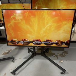 onn. 55” 4K UHD LED TV (not smart) w/ Rolling Stand