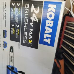 In Box.  Kobalt 12 In Chainsaw.  Charger N Battery Includef