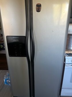 Frigidaire Side-by-Side Refrigerator with Ice and Water Dispenser