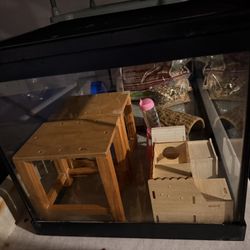 Aquarium, reptile, or hamster with accessories