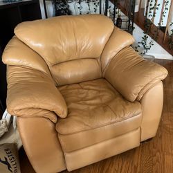 Orange Leather Chair And Matching Ottoman
