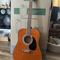 Esteban acoustic guitar, shoulder strap included
