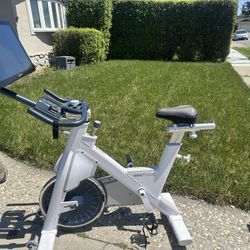 MYX Fitness Stationary Bike w/ Screen and Armband