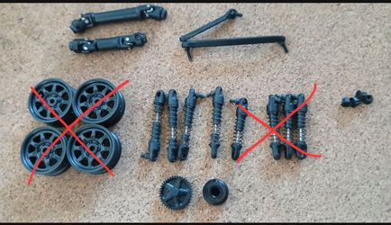 Axial scx30 spare parts, 25mm shocks ,center drive line from k10 ,steering links,lugnut, transmission gears.