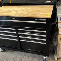 Husky 46 in. x 25 in. D 9-Drawer Mobile Workbench with Adjustable Height Wood Top in Gloss Black