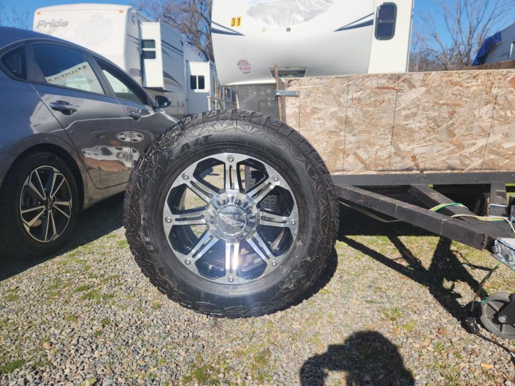 NEVER USED!!!! 20" Eagle Alloy Rims W/ 35" FALKEN WildPeak A/T Tires