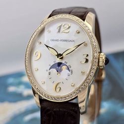 Girard-Perregaux Cat’s Eye Moon Phase Diamond Bezel 18K Rose Gold Ladies Watch