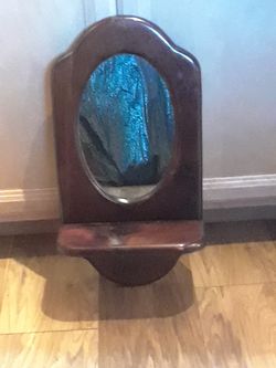 Wooden shelf with mirror