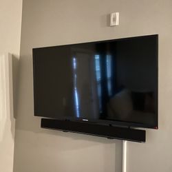 45 Inch Toshiba FIRE TV w/ tilted Mount (sound bar NOT included) 