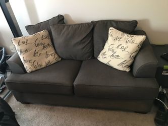 Charcoal Gray Fabric Loveseat with 2 pillows