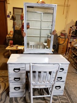 Vanity with mirror and chair