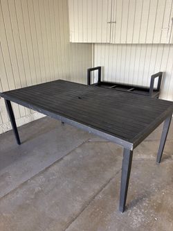 Outdoor dining table and benches