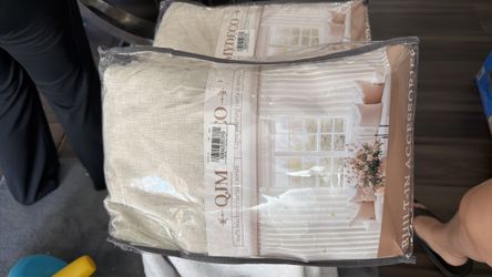 2 light filtering curtains blackout