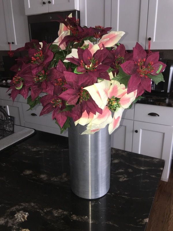 Silk Christmas Winter Pointsettas in tall Cylinder metal vase