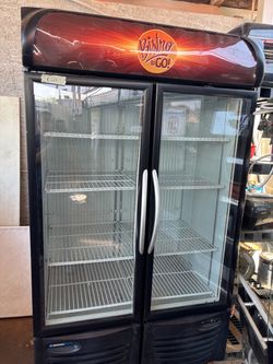 Two-glass-door refrigerator; this unit is new and has never been used.