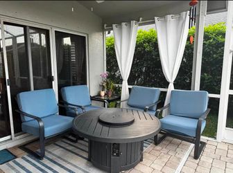 Outdoor patio set with fire pit