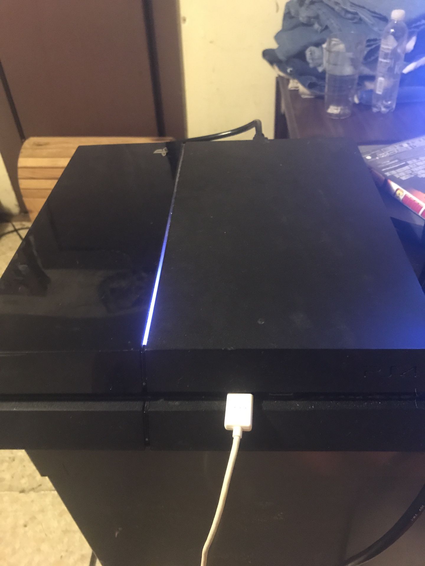 Ps4 with madden 18 and 2k16 17 18 and 19 and more games with a controller and all of power cable cords