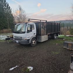 FORD LCF LANDSCAPE DUMP TRUCK WITH FAB SHOP BED ON IT