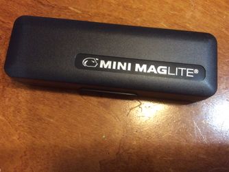 A MINI MAGLITE with battery, brand new for $5, I have 2 $5 each
